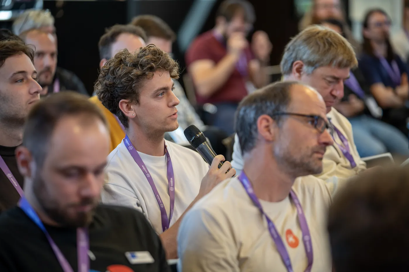 Elias (left) and Max (right) in the audience at the Oxidize conference in Berlin.